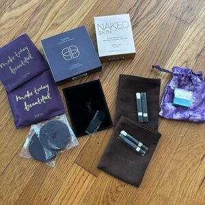 Bundle of High End Cosmetic Dust Bags, Brushes, and Sponges